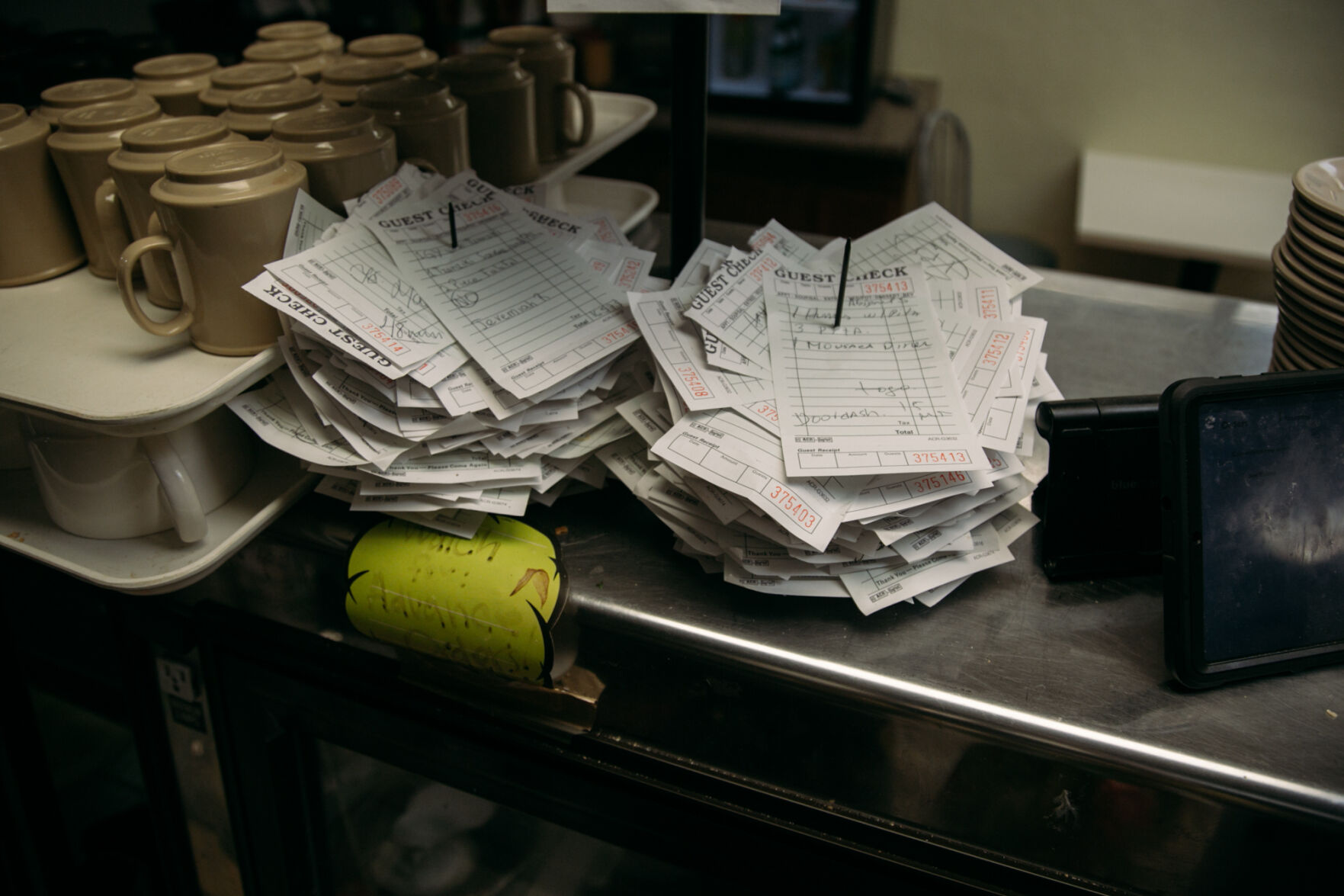 The stack of orders in the International Café.